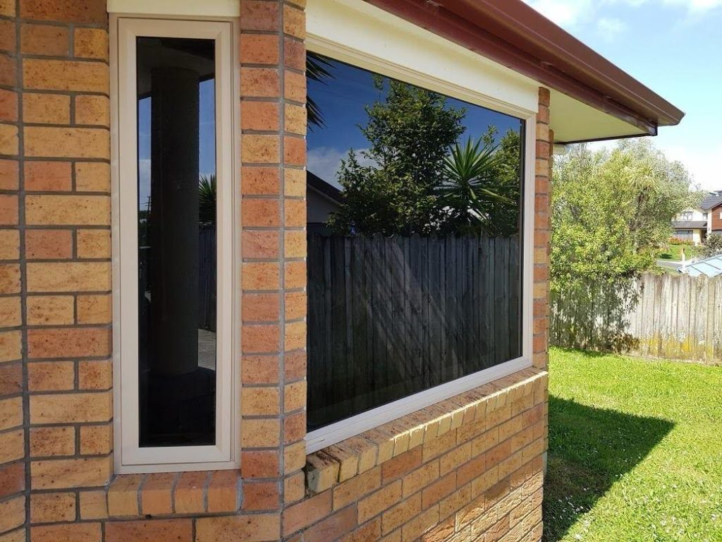 Tinted window on a brick home in Brisbane